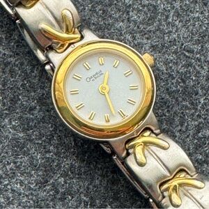 Bulova Gold and Silver Two-Tone Watch with Roman Numerals